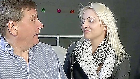 Sexy blonde babe in a sexy outfit on top of the bed and a nice blowjob