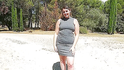 Blonde in a white dress is showing her face and tits