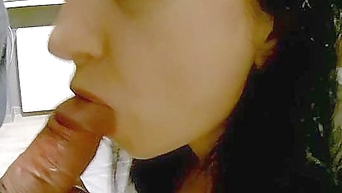 Sexy brunette in a red bikini and stockings is fucked