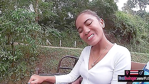 Big boobed asian teen riding an elephant with camera