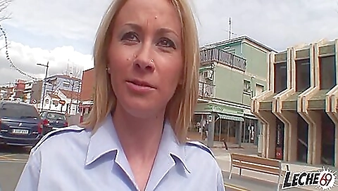 A sexy blonde is getting a hot cumshot on her face