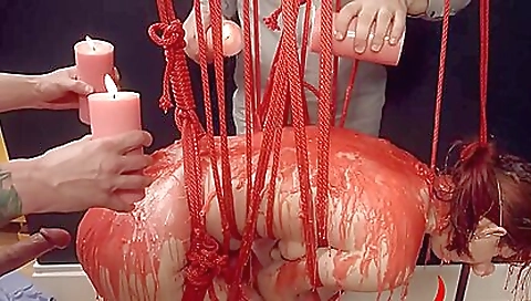 Sexy redhead in red lingerie is deepthroated and fucked