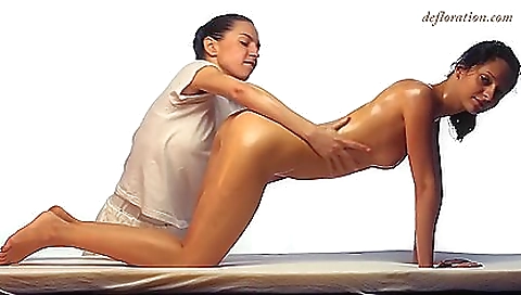 Sexy lesbian blonde and brunette is being massaged and penetrated