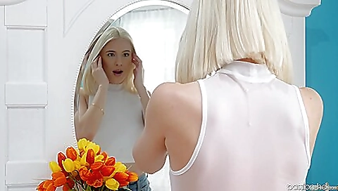 Blonde teen with a tight dress enjoys a fantastic porn video