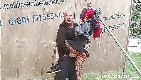 Busty redhead with big boobs is wearing sexy stockings